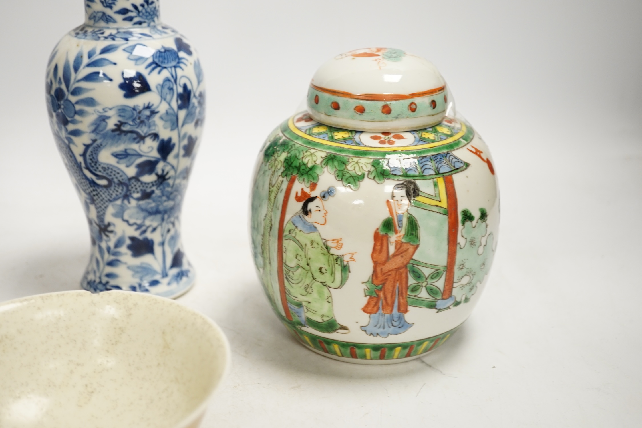 Chinese ceramics to include a crackleware vase and a blue and white vase, a jar and cover and a rice bowl, tallest 20cm high. Condition - all items damaged, overall poor